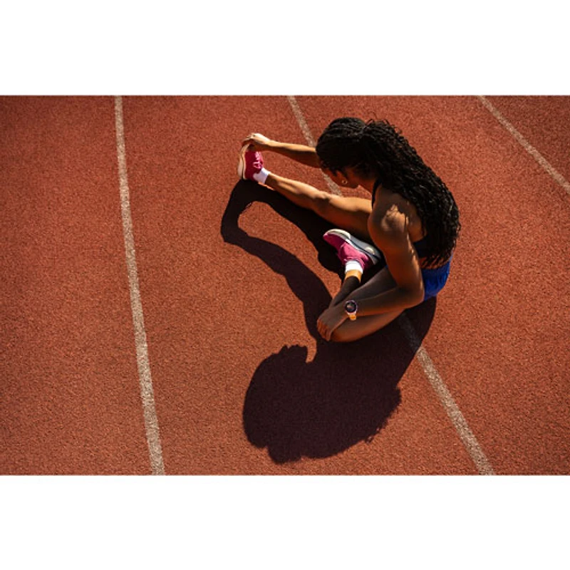 Montre intelligente Bluetooth de 47 mm Forerunner 970 de Garmin pour la course - Blanc/Jaune vif translucide