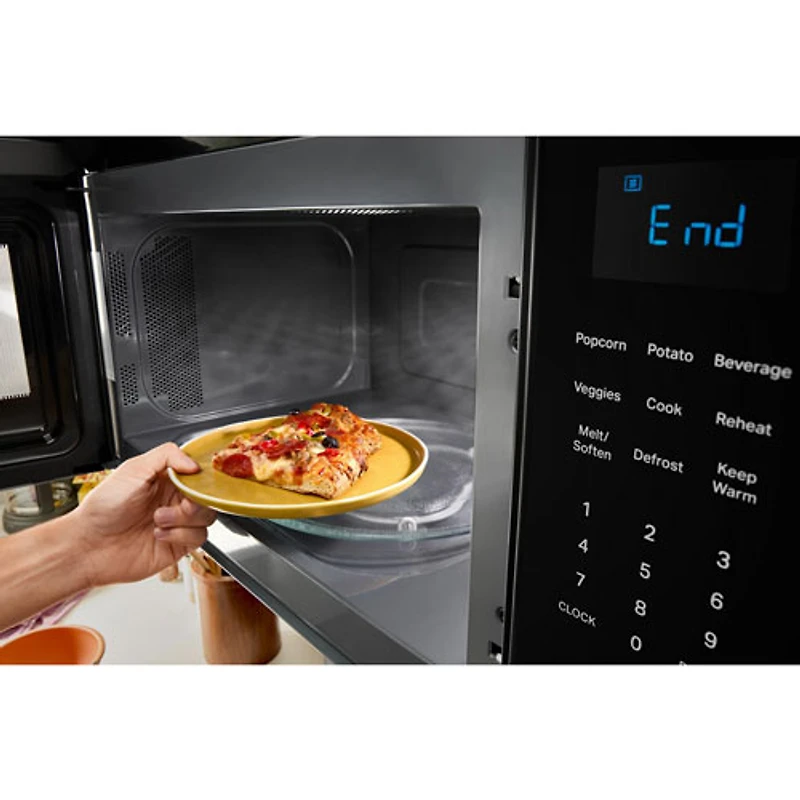 Four à micro-ondes à hotte intégrée de Whirlpool - 1,9 pi³ - Acier inoxydable