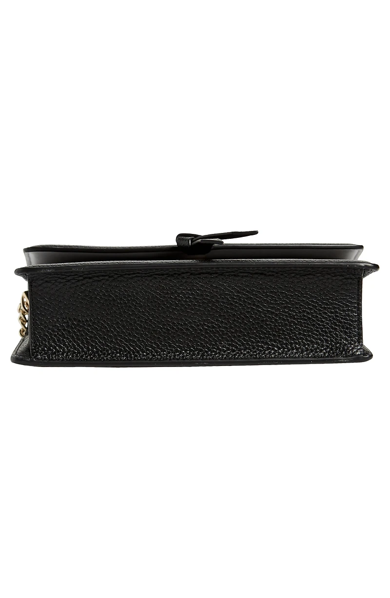 knott pebbled leather flap crossbody bag