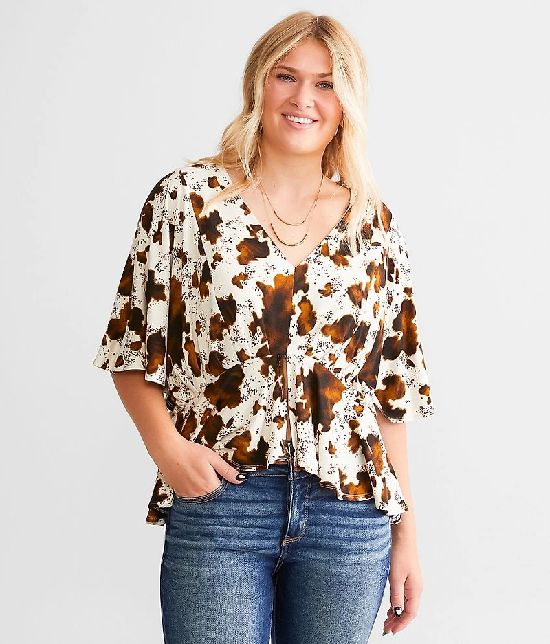 Cow Print Split Peplum Top