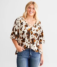 Cow Print Split Peplum Top