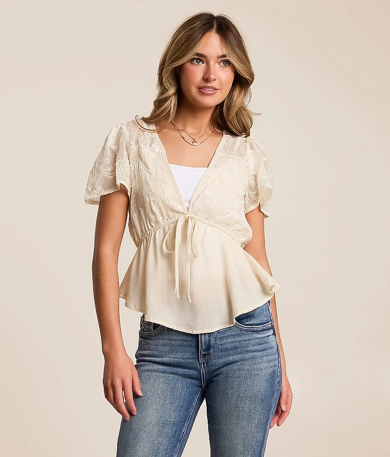 Embroidered Peplum Top