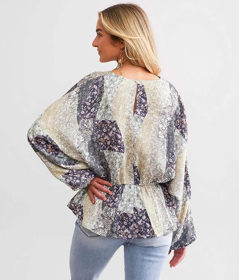 Floral Peplum Dolman Top