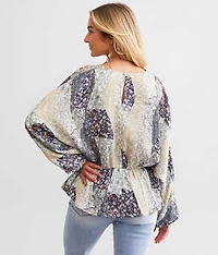 Floral Peplum Dolman Top