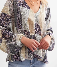 Floral Peplum Dolman Top