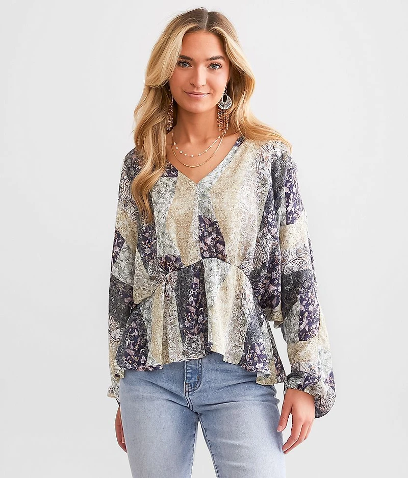Floral Peplum Dolman Top