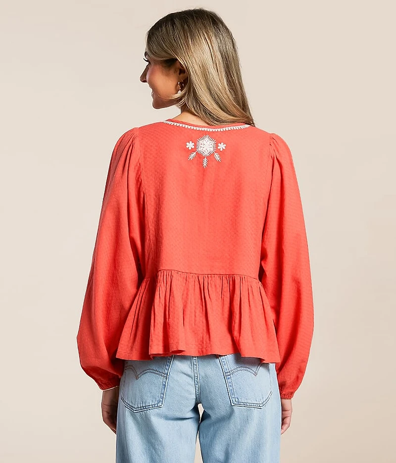 Embroidered Peplum Top