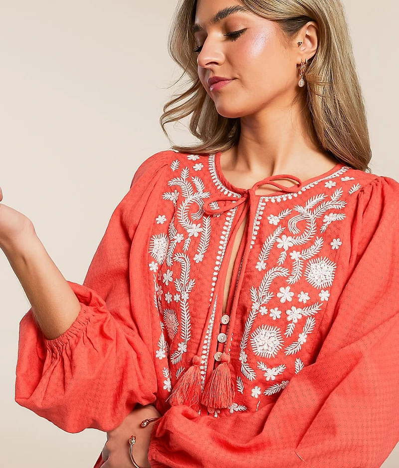 Embroidered Peplum Top
