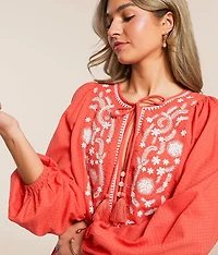 Embroidered Peplum Top
