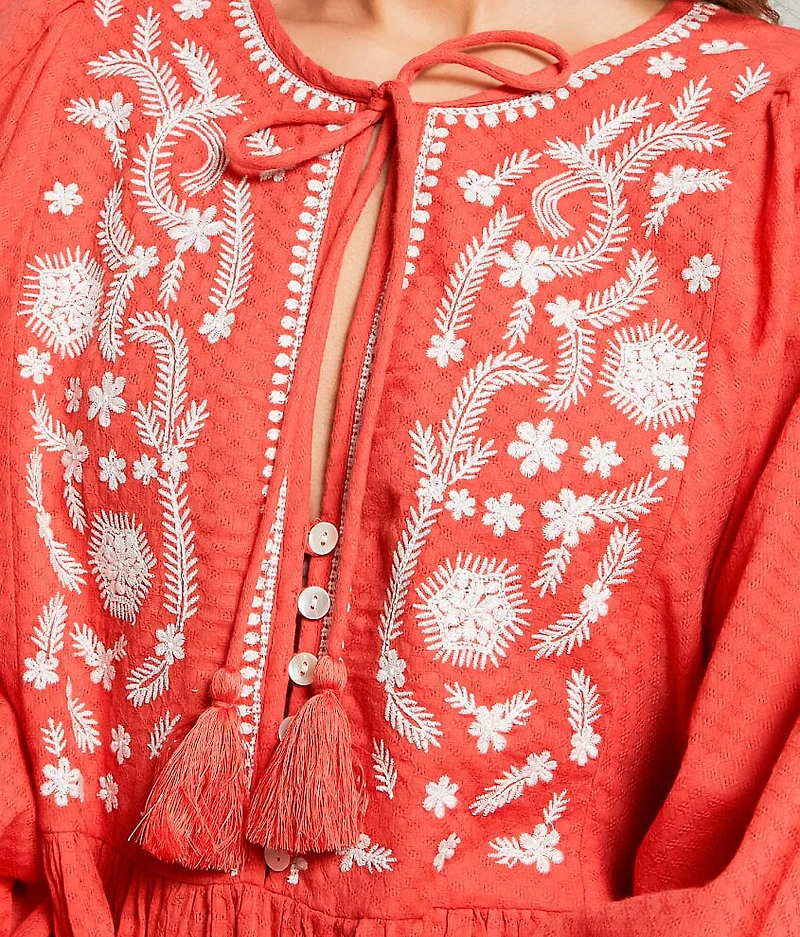 Embroidered Peplum Top
