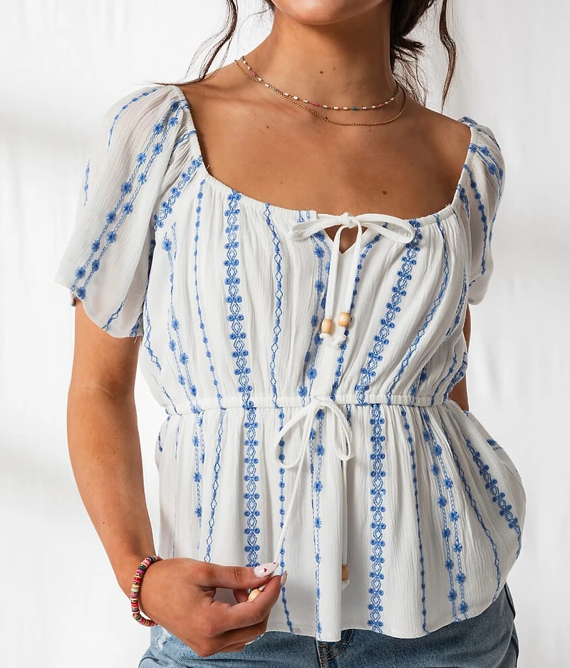 Floral Embroidered Peplum Top