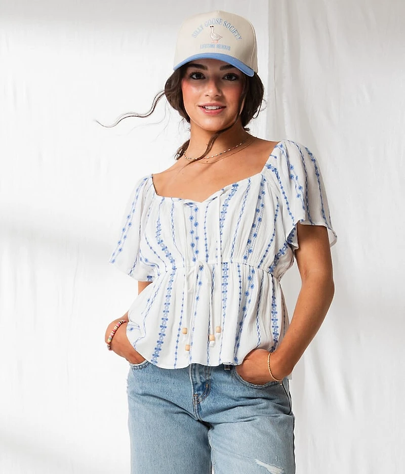 Floral Embroidered Peplum Top