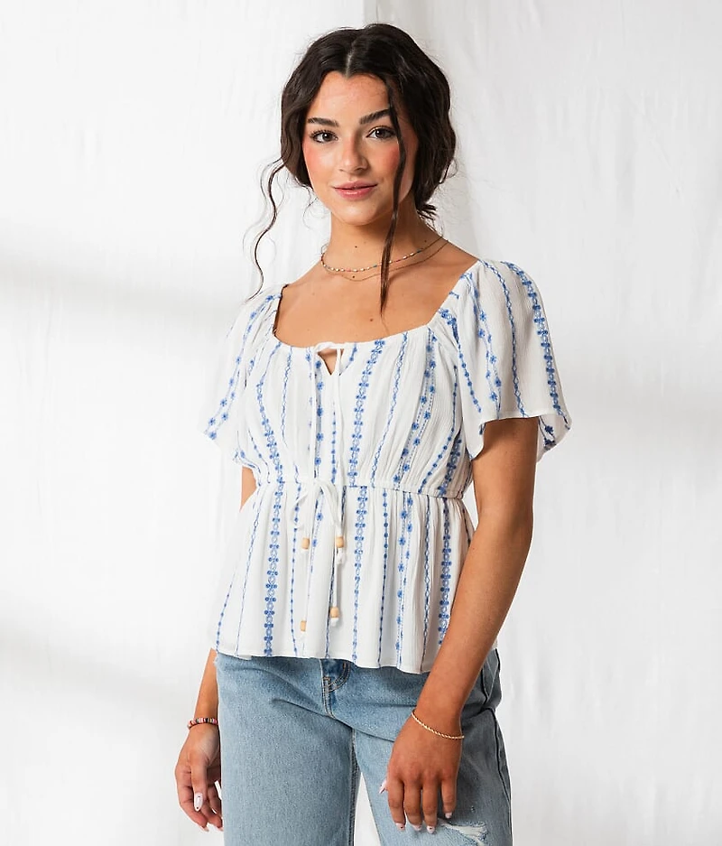 Floral Embroidered Peplum Top