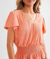 Plisse Peplum Top