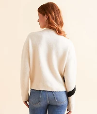 Eyelash Tinsel Bow Sweater