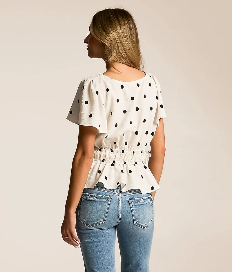 Polka Dot Peplum Top