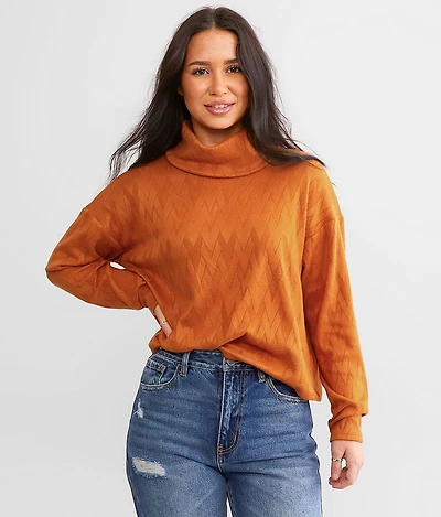 Turtleneck Chevron Top