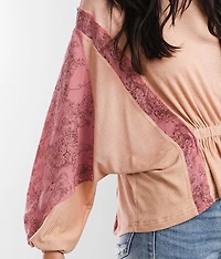 Pieced Rib Knit Peplum Top