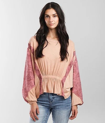 Pieced Rib Knit Peplum Top