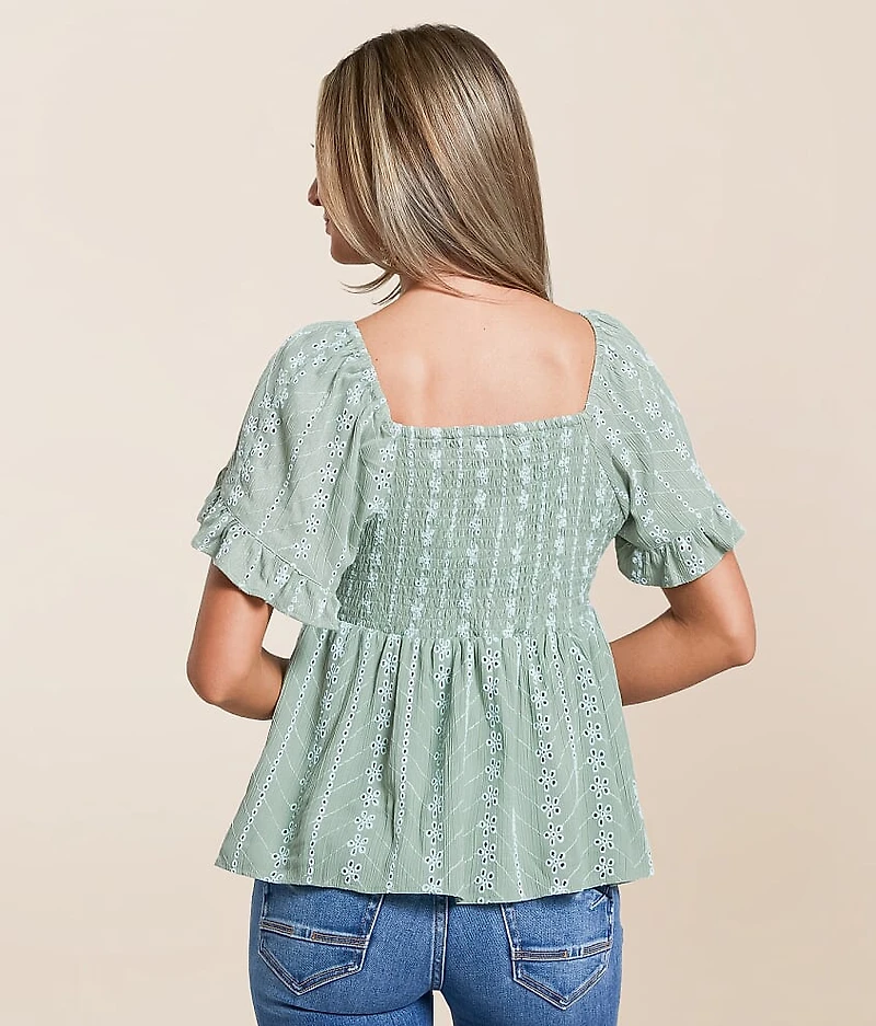 Twisted Front Peplum Top