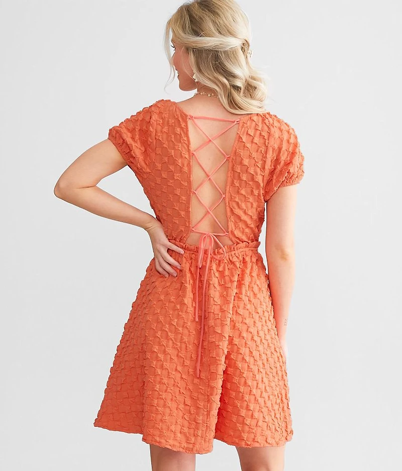 Smocked Lace-Up Mini Dress