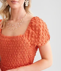Smocked Lace-Up Mini Dress