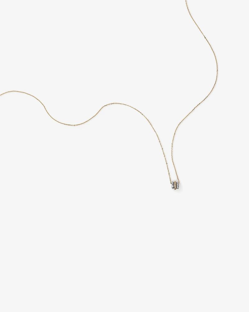 Trio Pendant with .09 Carat TW Diamonds in Sterling Silver and 10kt Yellow gold