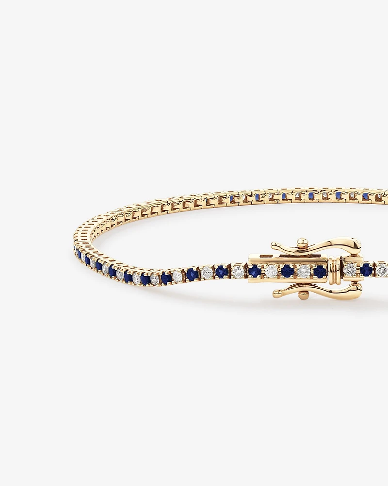 Bracelet tennis en or jaune 10 kt avec diamants de 0,68 carat TW et saphirs créés