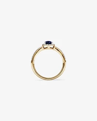 Oval Cut Blue Created Sapphire and Lab-Grown Diamond Halo Ring in 10kt Yellow Gold and Rhodium