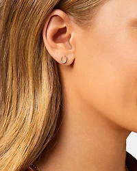 Mini boucles d'oreilles en fer à cheval en or jaune 10 K avec diamants