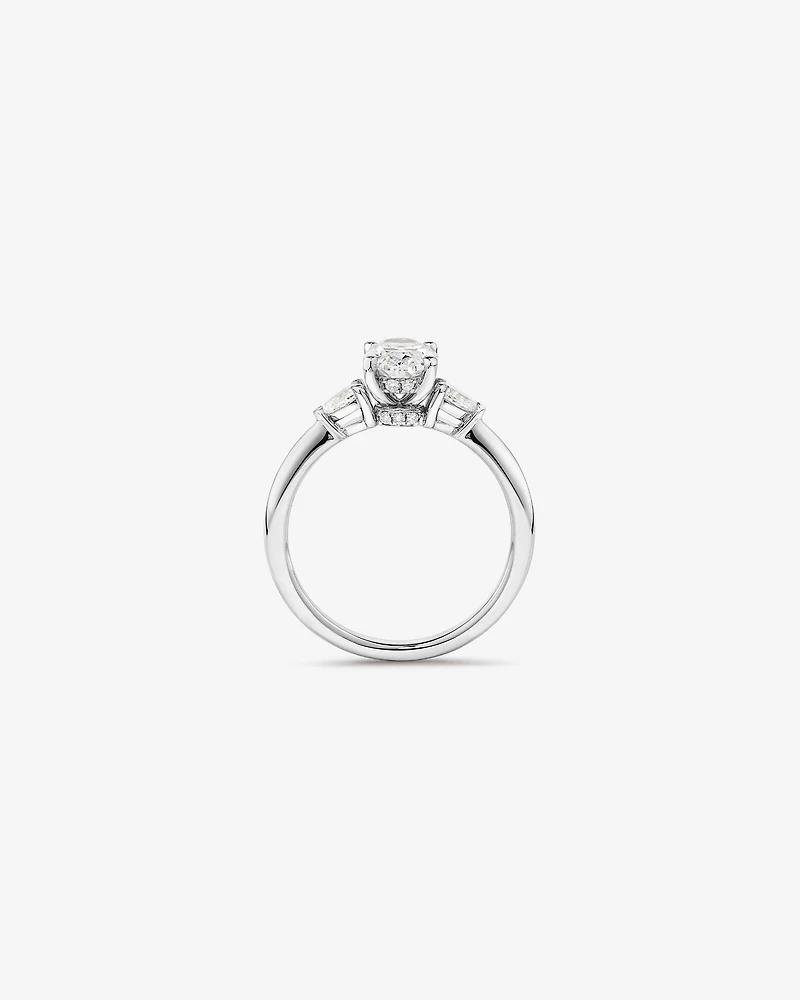 1.10 Carat TW Three Stone Oval and Pear Hidden Halo Engagement Ring in Platinum