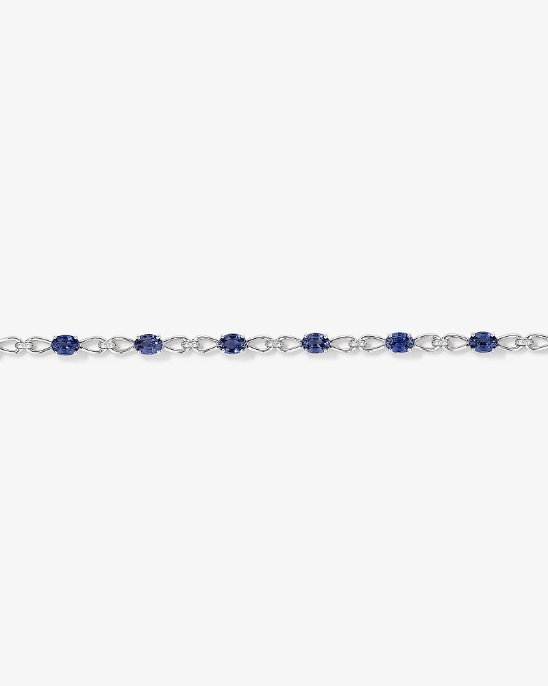 Oval Cut Blue Created Sapphire Gemstone and Diamond Bracelet in Sterling Silver