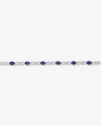 Oval Cut Blue Created Sapphire Gemstone and Diamond Bracelet in Sterling Silver