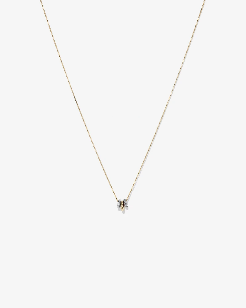 Trio Pendant with .09 Carat TW Diamonds in Sterling Silver and 10kt Yellow gold
