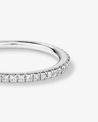 Alliance en or blanc 14 K avec diamants totalisant 0,20 ct