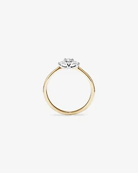 0.15 Carat TW Three Stone Round Brilliant and Oval Cut Diamond Promise Ring in 10kt Yellow and White Gold