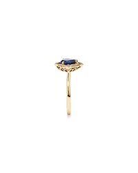 Pear Cut Created Sapphire and Diamond Halo Ring in 10kt Yellow Gold