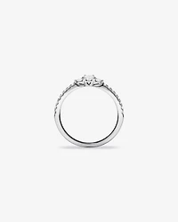 0.40 Carat TW Oval and Round Brilliant Three Stone Side Accent Engagement Ring in 14kt White Gold