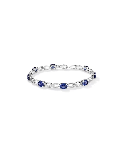 Oval Cut Blue Created Sapphire Gemstone and Diamond Bracelet in Sterling Silver