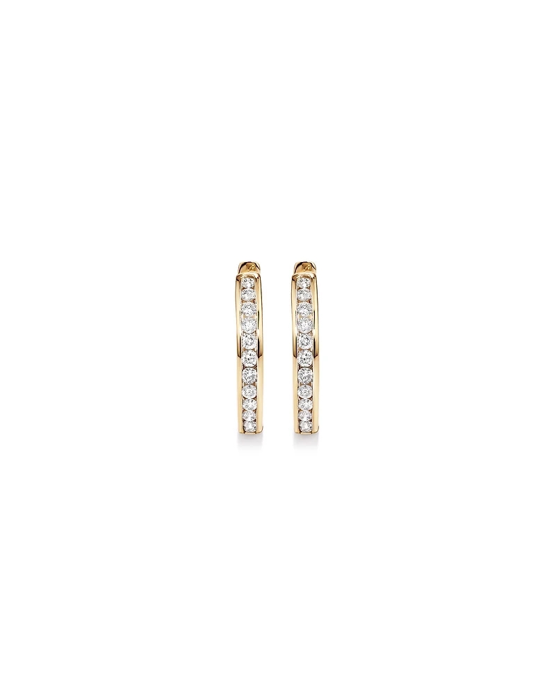 0.25 Carat TW Channel Set Round Brilliant Diamond Huggie Hoop Earrings in 10kt Yellow Gold