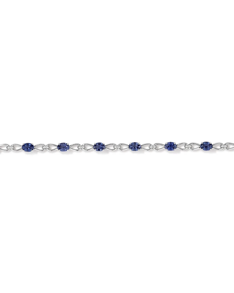 Oval Cut Blue Created Sapphire Gemstone and Diamond Bracelet in Sterling Silver