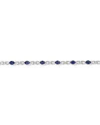 Oval Cut Blue Created Sapphire Gemstone and Diamond Bracelet in Sterling Silver