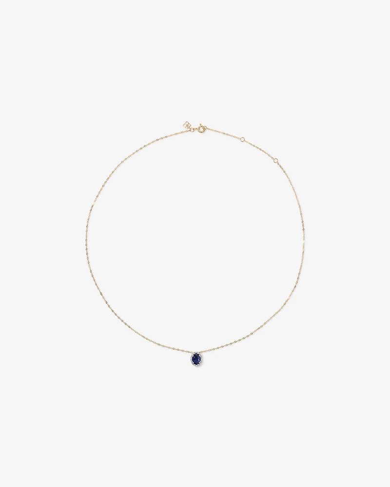 Oval Cut Blue Created Sapphire and Lab-Grown Diamond Halo Stud Earrings and Pendant Necklace Set in 10kt Yellow Gold and Rhodium
