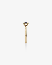 Emerald Cut Blue Sapphire Gemstone and 0.09 Carat TW Diamond Halo Ring in 10kt Yellow Gold