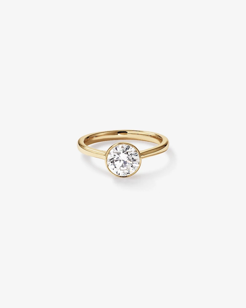 Bague de fiançailles solitaire sertie clos en diamant rond brillant de 1,25 carat TW, en or jaune 14 kt