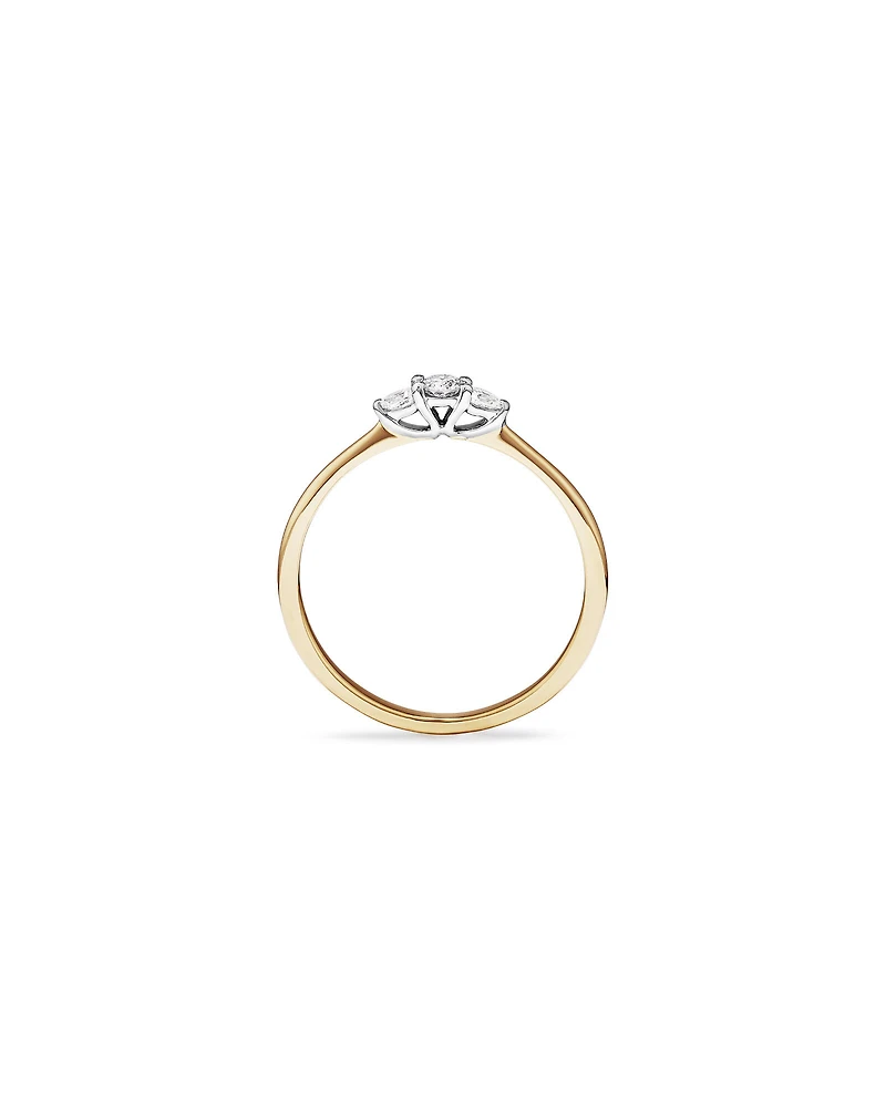 0.15 Carat TW Three Stone Round Brilliant and Oval Cut Diamond Promise Ring in 10kt Yellow and White Gold