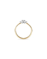 0.15 Carat TW Three Stone Round Brilliant and Oval Cut Diamond Promise Ring in 10kt Yellow and White Gold