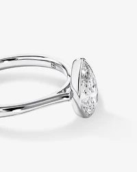 1.25 Carat TW Pear Cut Laboratory-Grown Diamond Solitaire Bezel Set Engagement Ring in 14kt Yellow Gold