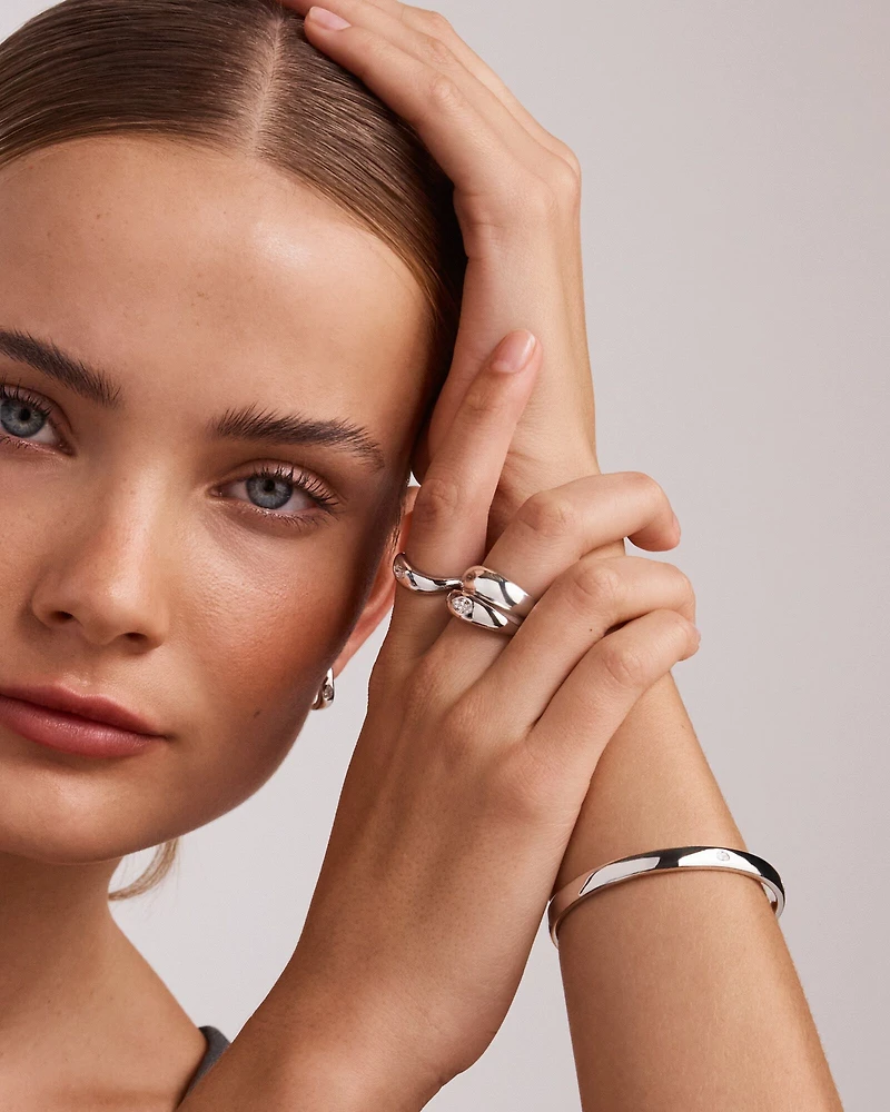 0.20 Carat TW Laboratory-Grown Marquise Diamond Swirl Ring in Sterling Silver