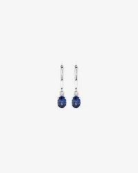 Oval Cut Blue Created Ceylon Sapphire Gemstone and Diamond Drop Huggie Earrings in Sterling Silver